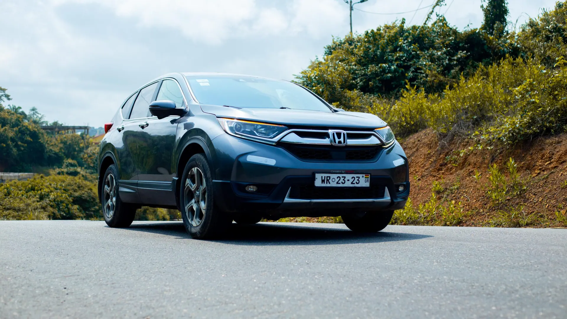Honda CR-V Touring on a hillside road