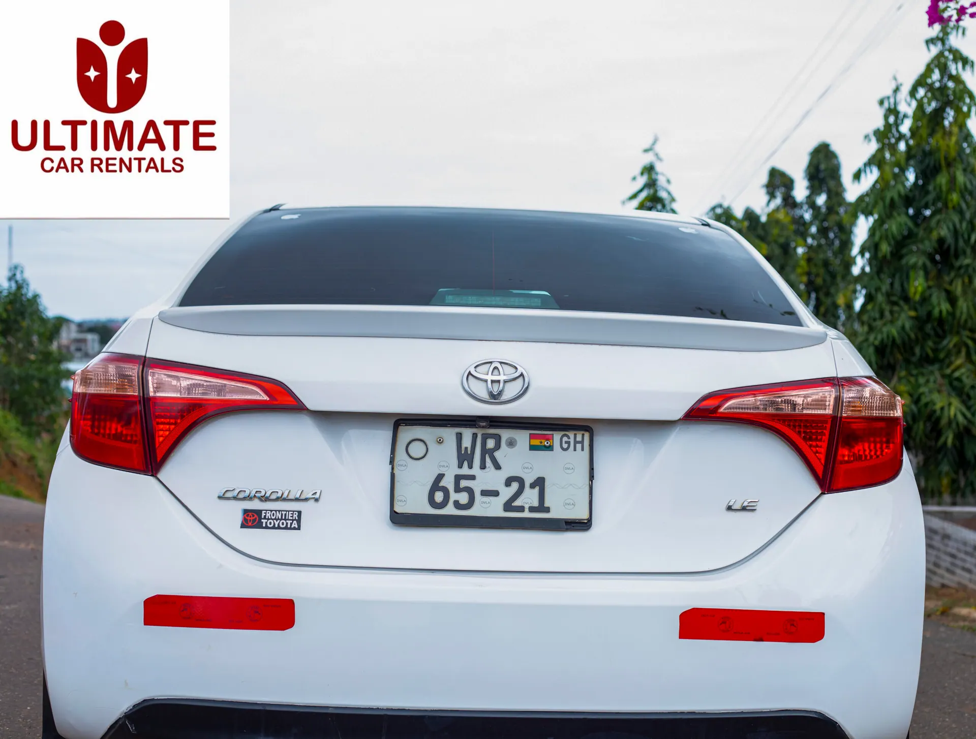 White Toyota Corolla front view
